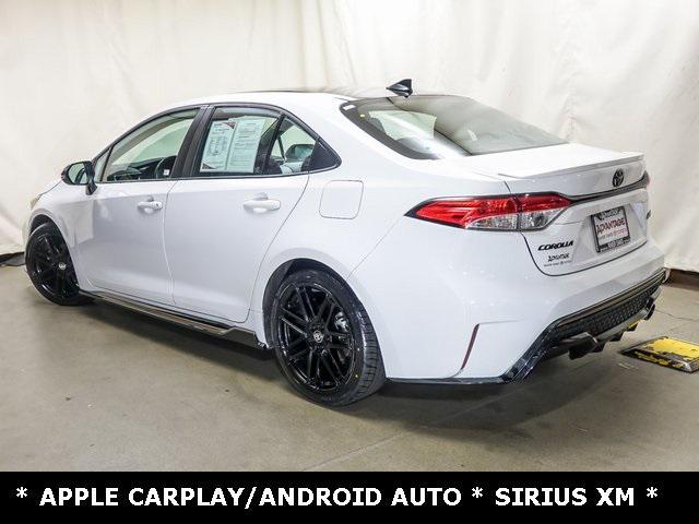 Photo of 2022 White w/Black Sand Pearl Roof Toyota Corolla