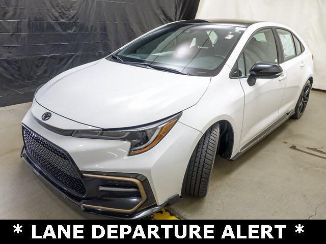 Photo of 2022 White w/Black Sand Pearl Roof Toyota Corolla