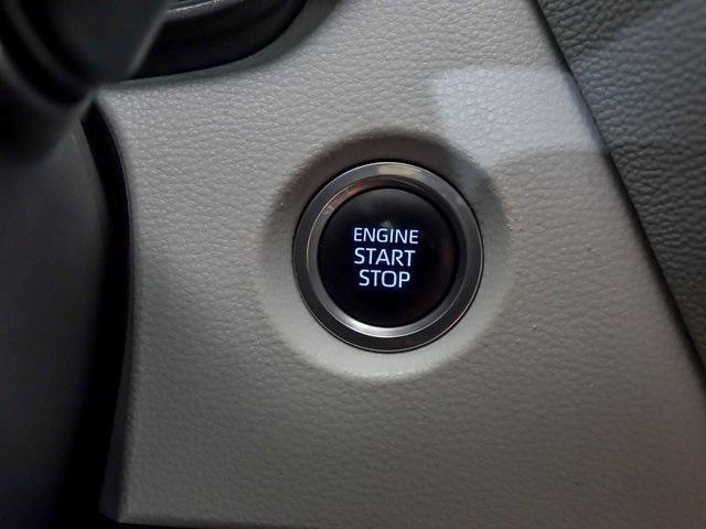 Photo of 2022 White w/Black Sand Pearl Roof Toyota Corolla