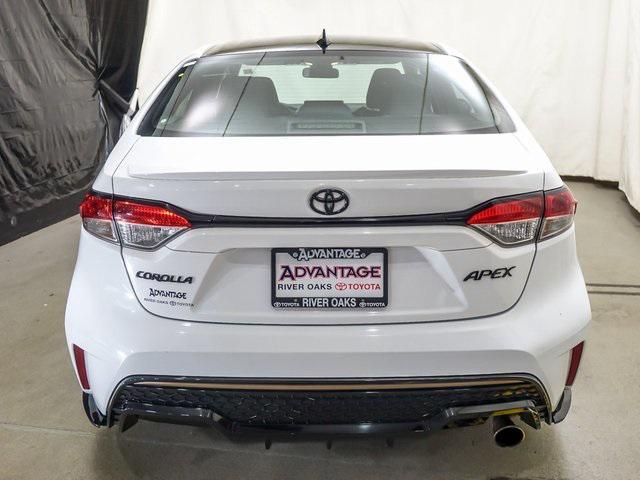 Photo of 2022 White w/Black Sand Pearl Roof Toyota Corolla