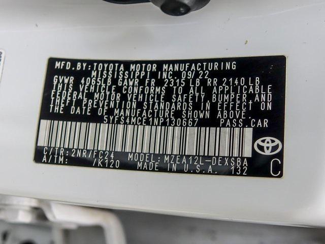 Photo of 2022 White w/Black Sand Pearl Roof Toyota Corolla