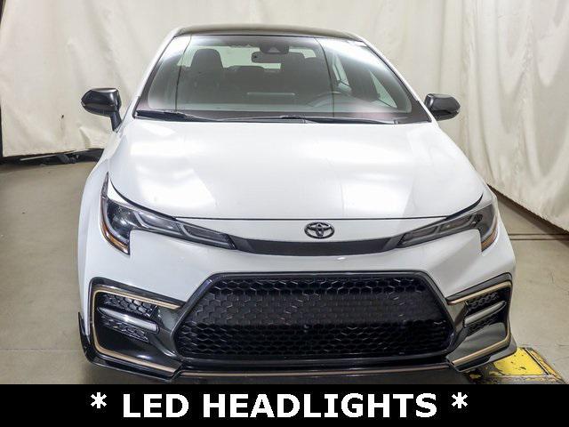 Photo of 2022 White w/Black Sand Pearl Roof Toyota Corolla