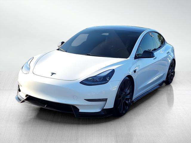 Photo of 2021 Pearl White Multi-Coat Tesla Model 3