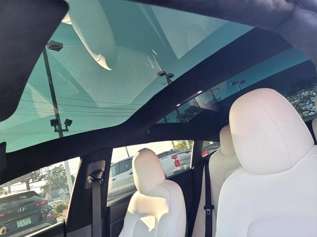 Photo of 2021 Pearl White Multi-Coat Tesla Model 3