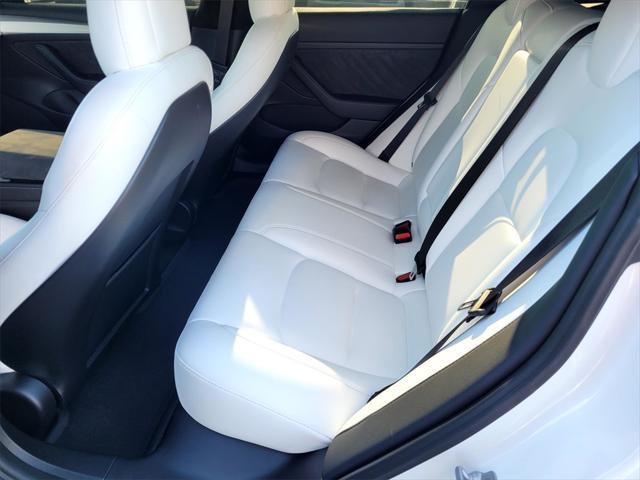 Photo of 2021 Pearl White Multi-Coat Tesla Model 3