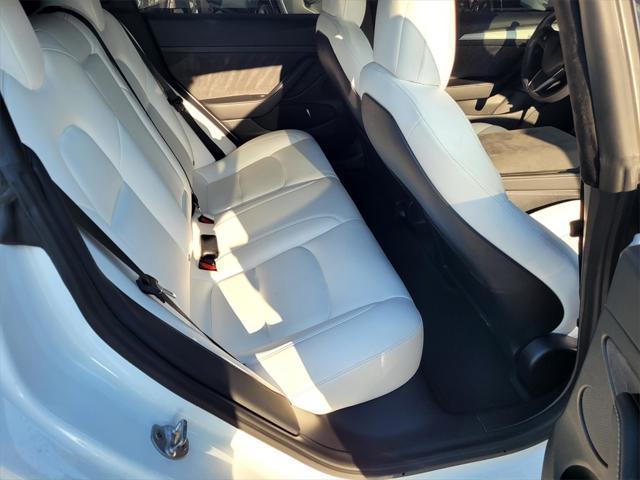 Photo of 2021 Pearl White Multi-Coat Tesla Model 3