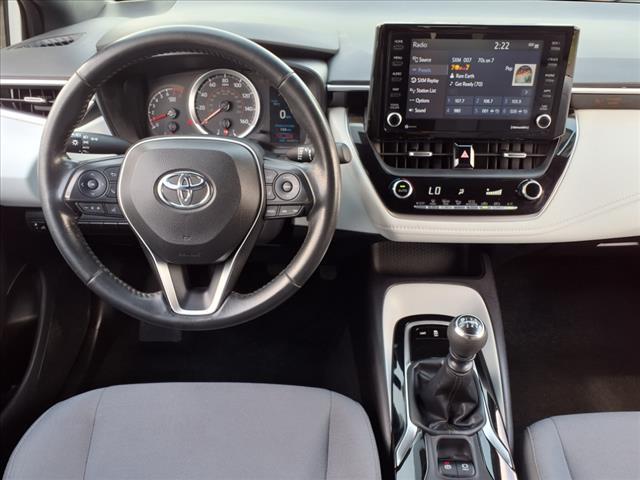 Photo of 2022 White w/Black Sand Pearl Roof Toyota Corolla