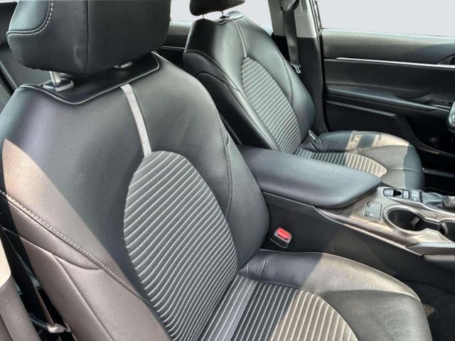 Photo of 2024 Midnight Black Metallic Toyota Camry