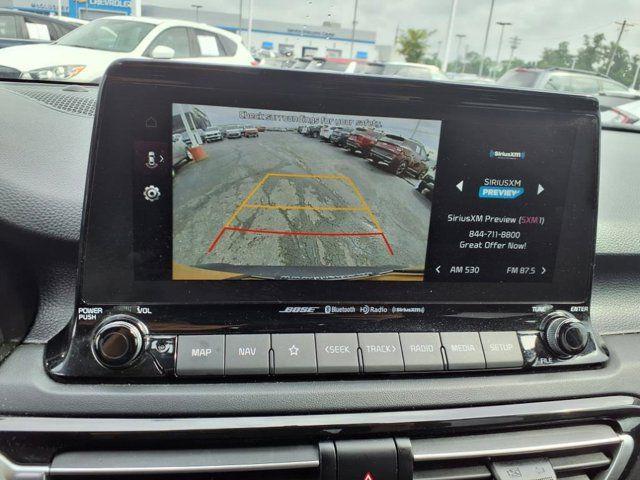 Photo of 2023 Starbright Yellow/Black Roof Kia Seltos