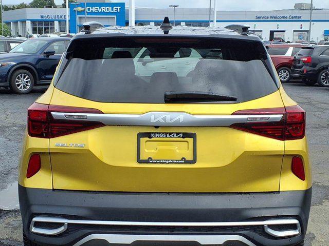 Photo of 2023 Starbright Yellow/Black Roof Kia Seltos