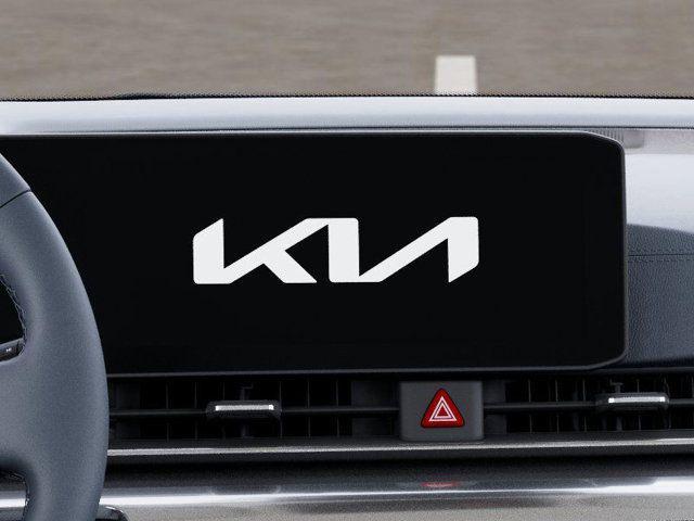 Photo of 2026 Snow White Pearl Kia Carnival Hybrid