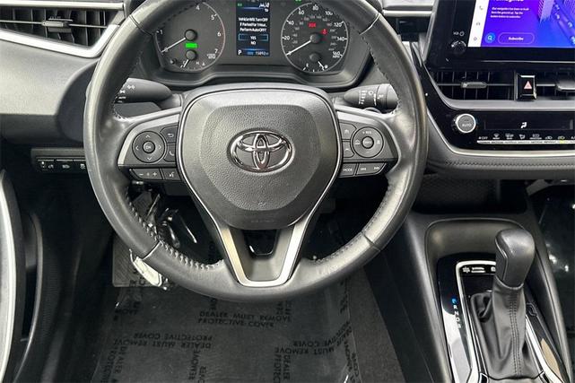 Photo of 2024 White Toyota Corolla Hybrid