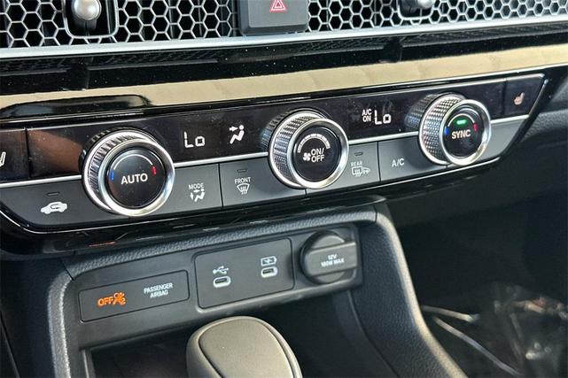 Photo of 2026 Solar Silver Metallic Honda Civic Hybrid