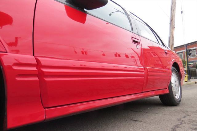 Photo of 1997 Bright Red Oldsmobile Cutlass Supreme