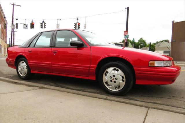 Photo of 1997 Bright Red Oldsmobile Cutlass Supreme