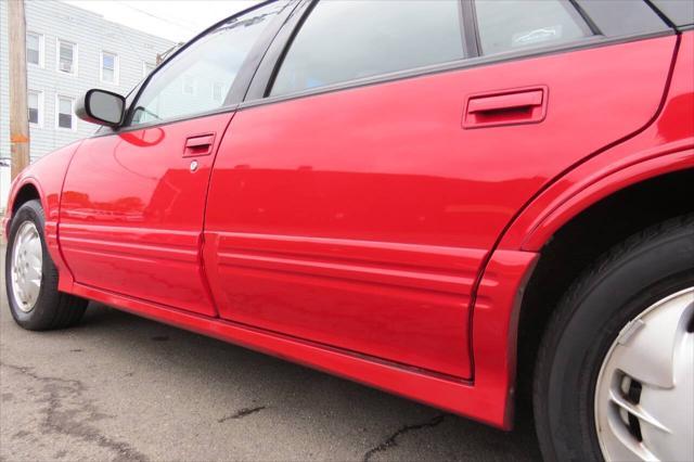Photo of 1997 Bright Red Oldsmobile Cutlass Supreme