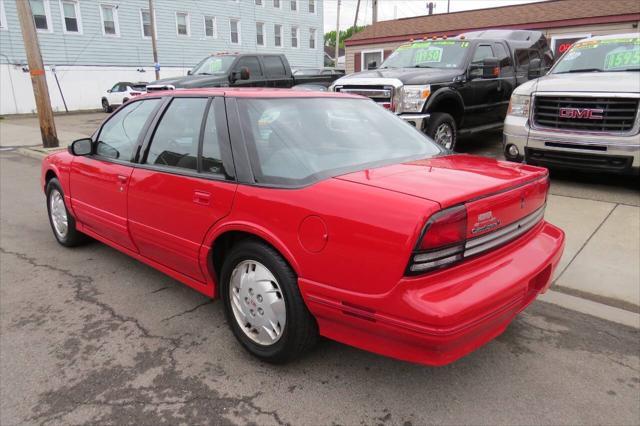 Photo of 1997 Bright Red Oldsmobile Cutlass Supreme