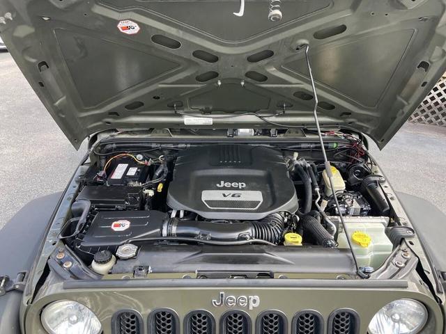 Photo of 2015 Tank Clearcoat Jeep Wrangler Unlimited