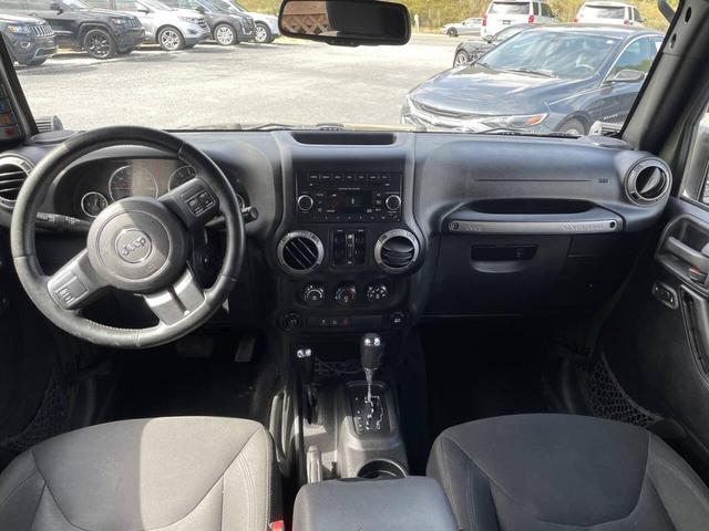 Photo of 2015 Tank Clearcoat Jeep Wrangler Unlimited