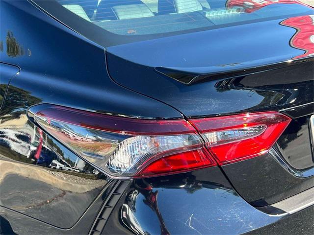 Photo of 2024 Midnight Black Metallic Toyota Camry