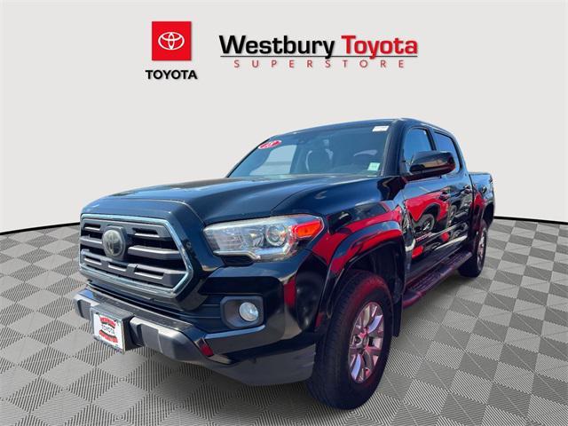 Photo of 2018 Midnight Black Metallic Toyota Tacoma
