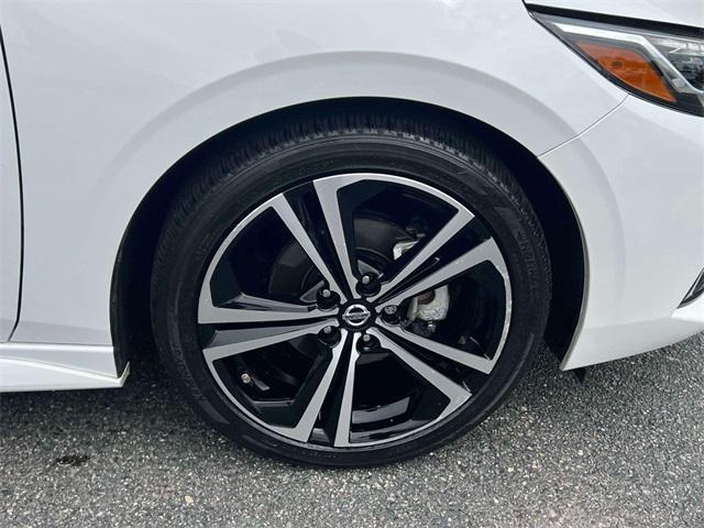 Photo of 2023 Aspen White Tricoat/Super Black Nissan Sentra