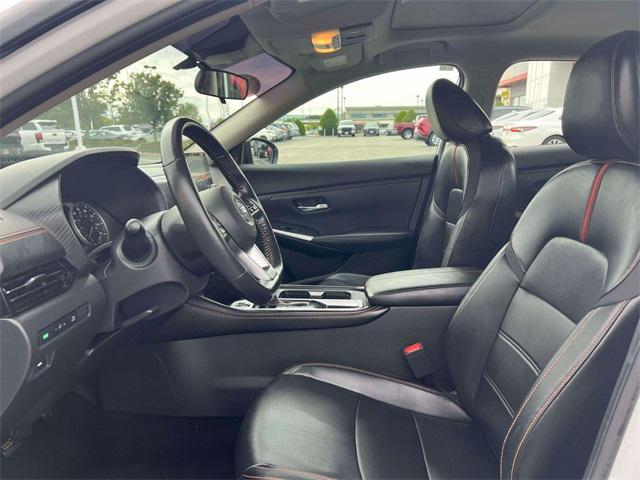 Photo of 2023 Aspen White Tricoat/Super Black Nissan Sentra