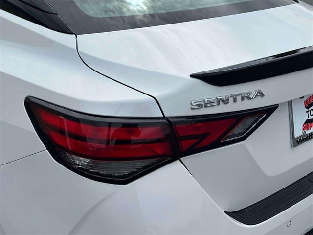 Photo of 2023 Aspen White Tricoat/Super Black Nissan Sentra