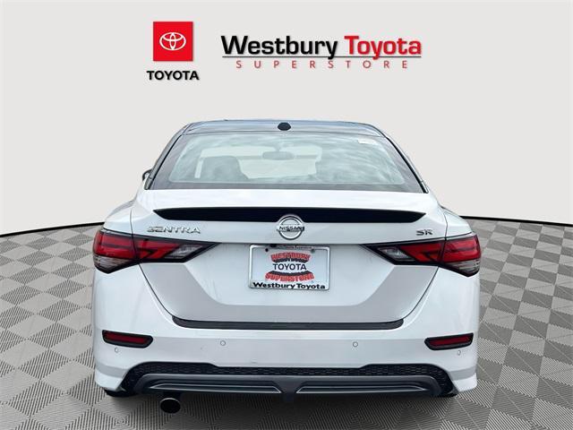 Photo of 2023 Aspen White Tricoat/Super Black Nissan Sentra