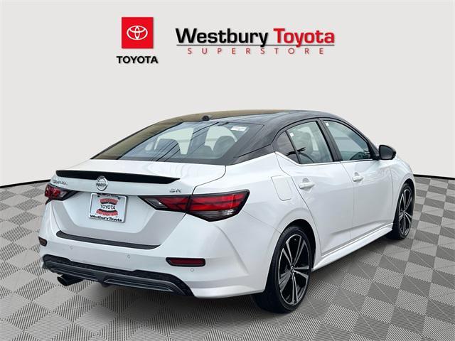 Photo of 2023 Aspen White Tricoat/Super Black Nissan Sentra