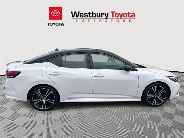 Photo of 2023 Aspen White Tricoat/Super Black Nissan Sentra