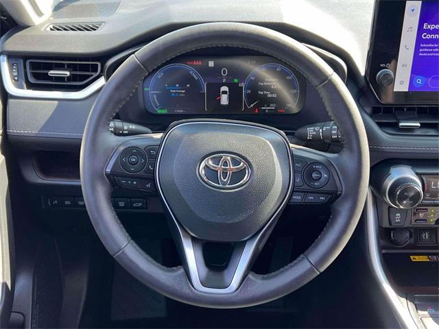 Photo of 2024 Midnight Black Metallic Toyota RAV4 Hybrid