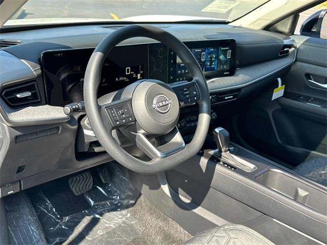 Photo of 2026 Aspen White Tri Nissan Kicks
