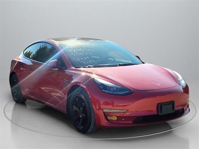 Photo of 2022 Red Metallic Tesla Model 3