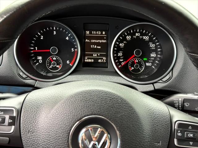 Photo of 2014 Black Uni Volkswagen Jetta SportWagen