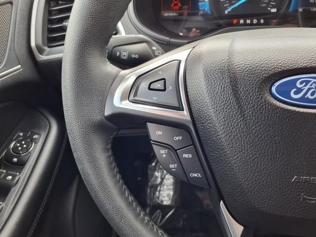 Photo of 2022 Atlas Blue Metallic Ford Edge