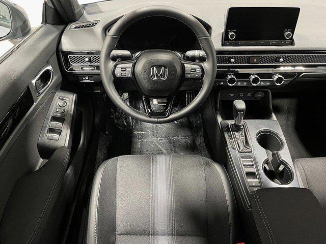 Photo of 2025 Sand Dune Pearl Honda Civic Hybrid