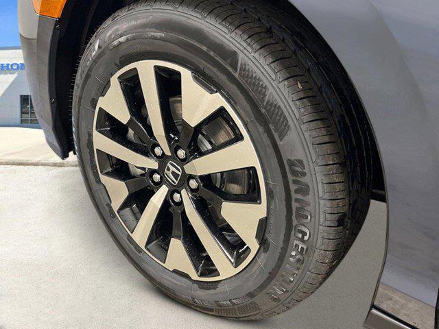Photo of 2025 Smoke Blue Pearl Honda Odyssey