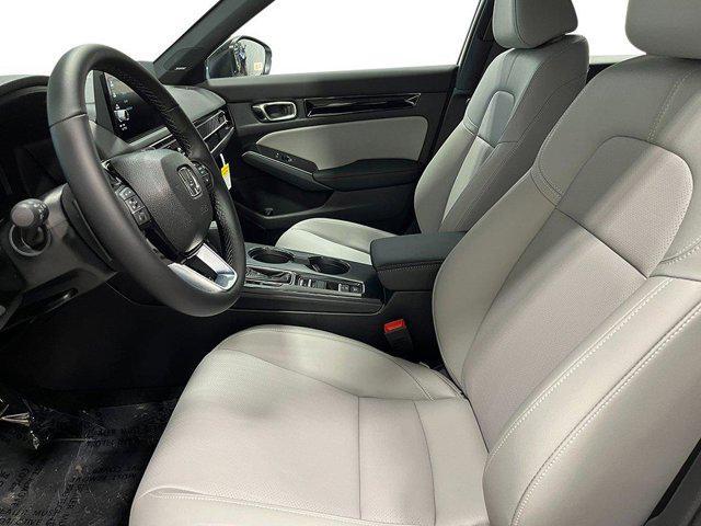 Photo of 2025 Platinum White Pearl Honda Civic Hybrid
