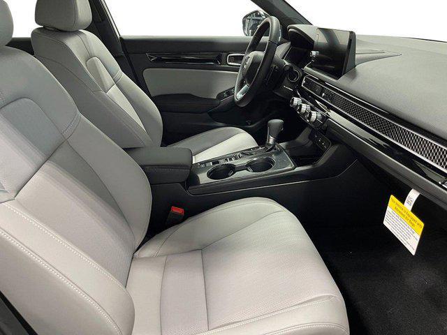 Photo of 2025 Platinum White Pearl Honda Civic Hybrid