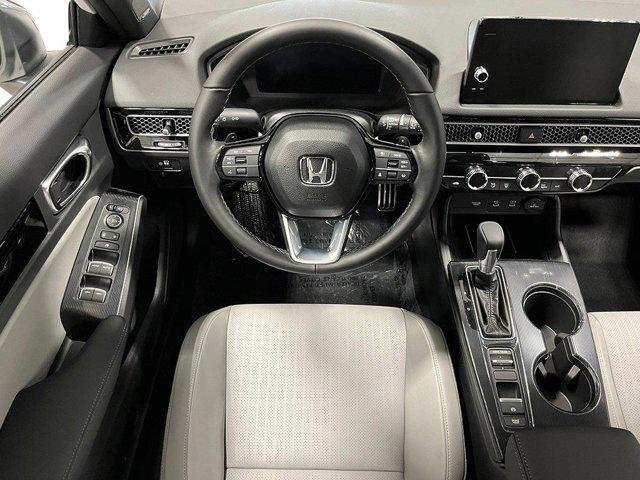 Photo of 2025 Platinum White Pearl Honda Civic Hybrid