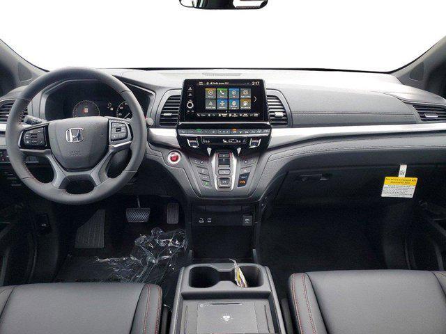 Photo of 2025 Radiant Red Metallic II Honda Odyssey