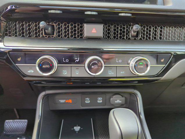 Photo of 2026 Radiant Red Metallic Honda CR-V