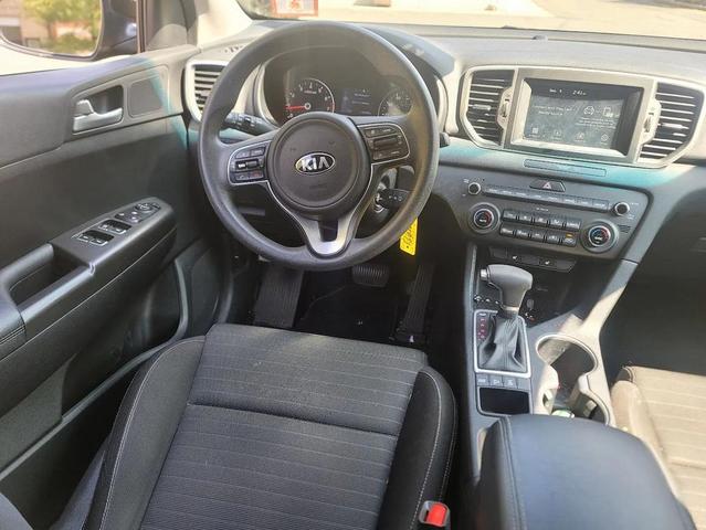 Photo of 2019 Black Cherry Kia Sportage