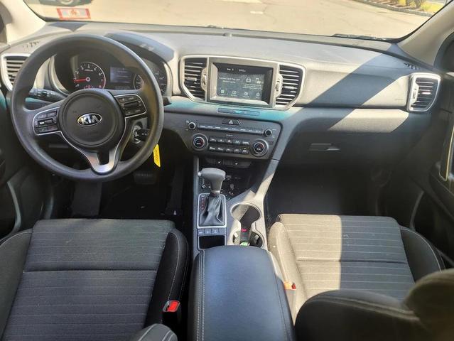 Photo of 2019 Black Cherry Kia Sportage