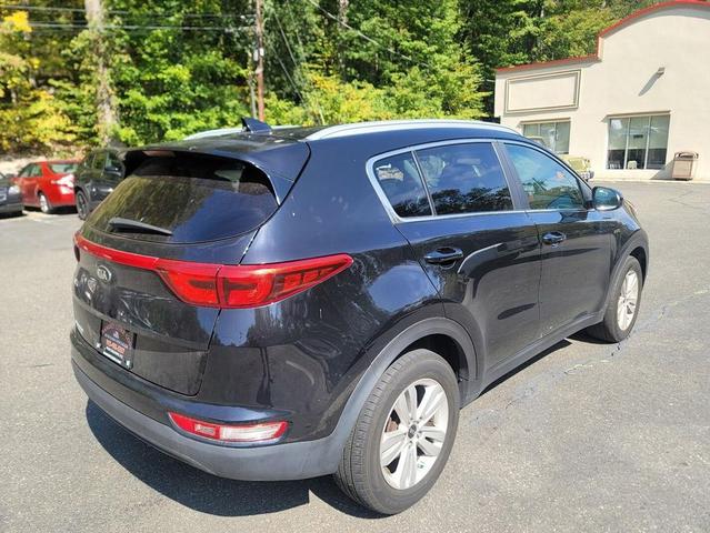 Photo of 2019 Black Cherry Kia Sportage