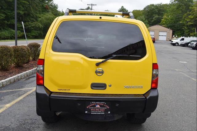 Photo of 2004 Solar Yellow Nissan Xterra