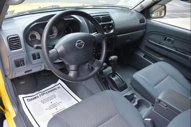 Photo of 2004 Solar Yellow Nissan Xterra