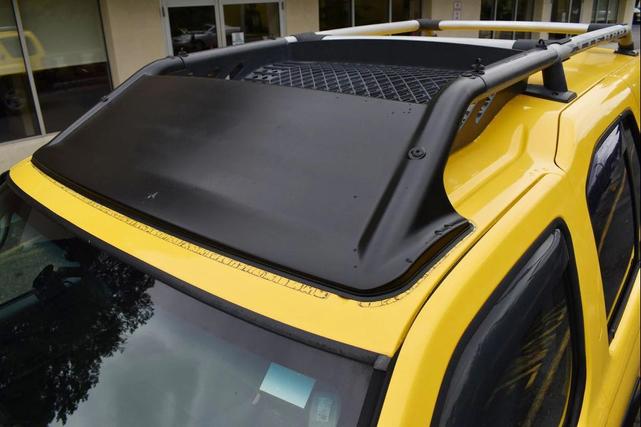 Photo of 2004 Solar Yellow Nissan Xterra