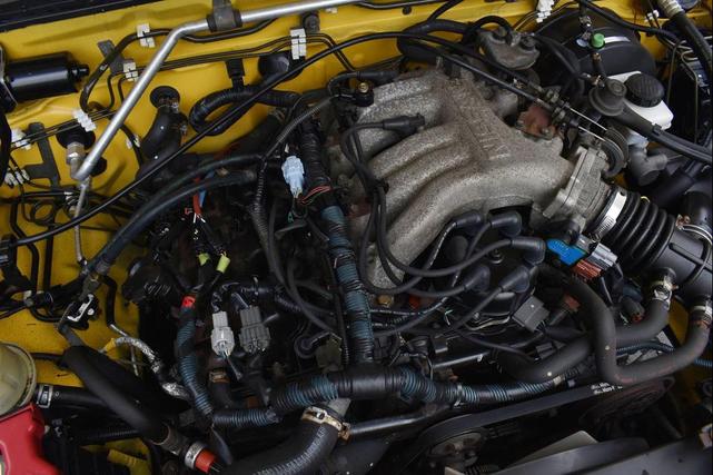 Photo of 2004 Solar Yellow Nissan Xterra